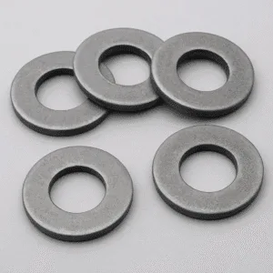 Mild steel plain washers for industrial punched fastener applications. Mild steel flat washers for industrial fastening and heavy load distribution.